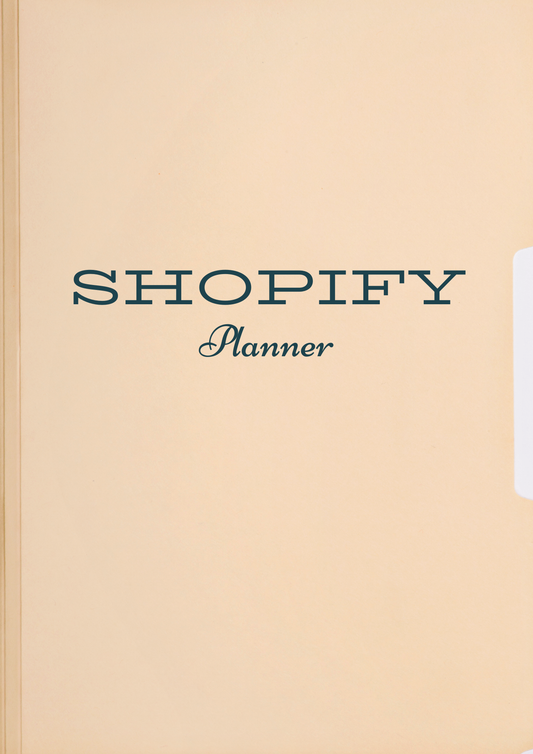 Beige planner with 'Shopify Planner' text on a beige background