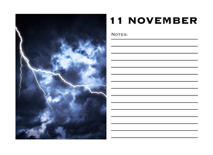 Calendar page with lightning storm image and '11 November' text